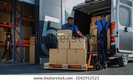 Outside of Logistics Warehouse with Open Door, Delivery Van Loaded with Cardboard Boxes. Truck Delivering Online Orders, Purchases, E-Commerce Goods, Wholesale Merchandise. Royalty-Free Stock Photo #2042952521