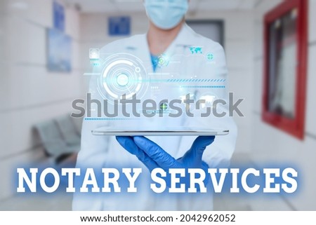 Hand writing sign Notary Services. Conceptual photo services rendered by a state commissioned notary public Man In Uniform Standing Holding Tablet Showing Medical Futuristic Tech.