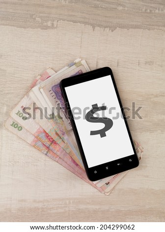 image of a phone with dollar symbol displayed on its screen