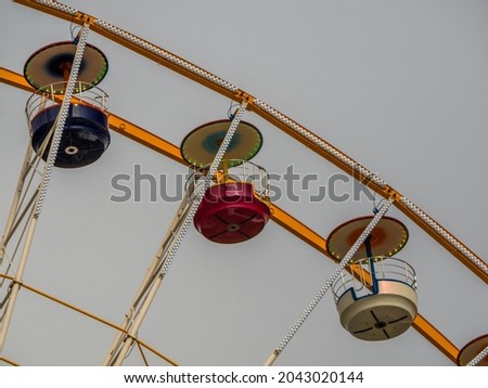 Big ferris wheel detail. Retro look Ferris wheel in amusement park