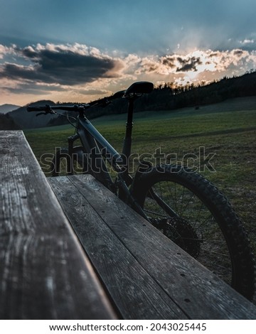 MTB exit. Bicycle at sunset. Elektobike. Sunset with beautiful colors, Slovakia . Orava
