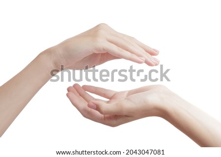 woman beautiful hands on a white background hold something