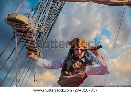 funny pirate captain on a pirate ship Royalty-Free Stock Photo #2043107957