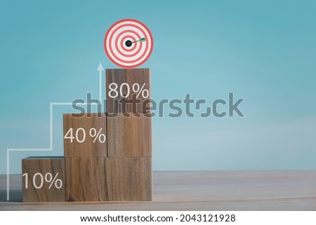 Realistic interest rate simulation concept. financial investment and the growth of the mortgage business on the wooden cube block the percentage symbol direction up icon