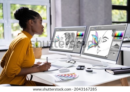 African Designer Woman Working On Computer Screen Royalty-Free Stock Photo #2043167285