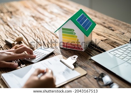 House Energy Audit. Efficient Consumption Invoice And Economy Royalty-Free Stock Photo #2043167513