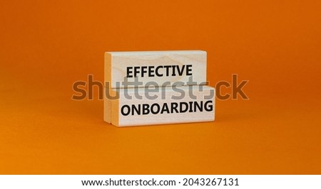 Effective onboarding symbol. Wooden blocks with words Effective onboarding on beautiful orange background. Business, HR and effective onboarding concept. Copy space.