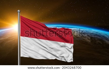 Indonesia national flag cloth fabric waving on beautiful sky.