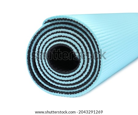 Rolled camping mat on white background, closeup
