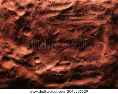 Surface of Mars with craters, impact craters on the surface of the red planet.