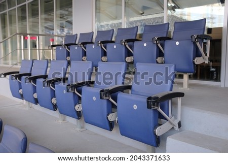 blue empty seats at the stadium