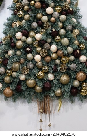Beautiful and decorated Christmas tree. Christmas mood. Great photo for greeting cards. 
Christmas toys. Retro toys
