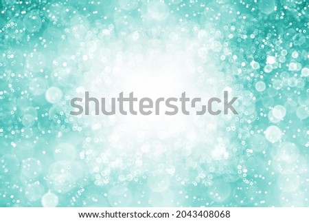 Teal green glitter white sparkle bokeh celebrate glam background for turquoise happy birthday party invite, aqua mint pastel color Spring Easter texture, bridal perfume or Christmas sale border frame Royalty-Free Stock Photo #2043408068