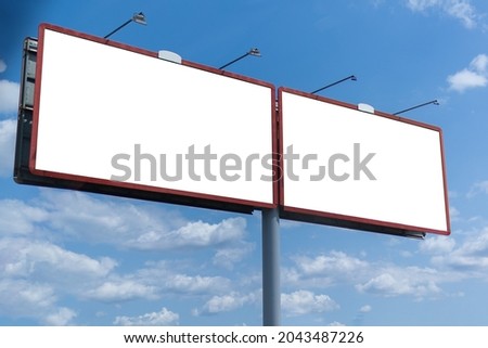 Background for design, billboards on city streets and along roads in the summer day