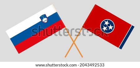 Crossed flags of Slovenia and the State of Tennessee. Official colors. Correct proportion