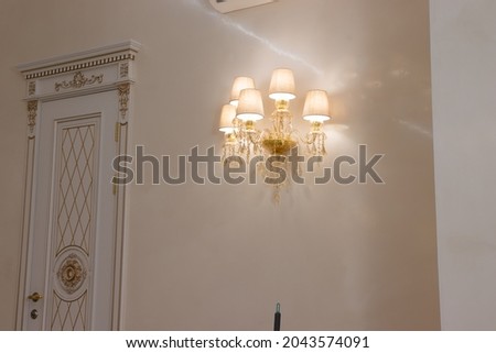 luxurious chandelier on the ceiling in a country house. large ceiling lamp in Venetian style