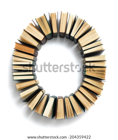 Letter O formed from the page ends of closed vintage hardcover books standing on a white background from a set or series of numbers
