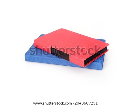 Stack of books in colour covers isolated on a white background