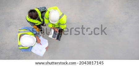 Banner : Civil engineer inspect structure at construction site against blueprint, Building inspector join inspect building structure with civil engineer. Civil engineer hold blueprint inspect building Royalty-Free Stock Photo #2043817145