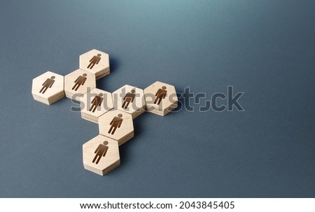 People are united in a group. Consolidation. Joining forces to achieve a common goal. Hiring employees, recruiting staff. Human resources. Grouping, self organization. Social processes. Royalty-Free Stock Photo #2043845405