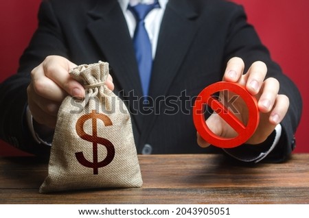 The man refuses to give out money. Refusal to provide a loan mortgage, bad credit history. Financial difficulties. Economic sanctions, confiscation of funds. Asset freeze seizure. Lobbying Royalty-Free Stock Photo #2043905051