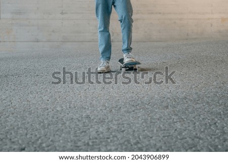macro of young man's foot on skateboard
