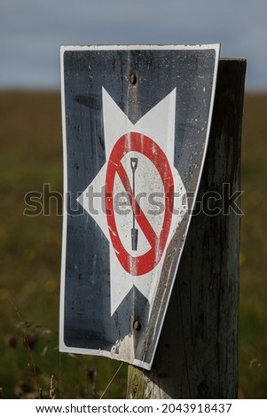 large army metal sign instructing military soldiers not to dig in conservation, archeological and historical site, Salisbury Plain military traning area Wilts UK