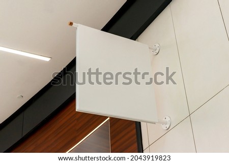 Blank shop sign board in shopping mall for logo promotion