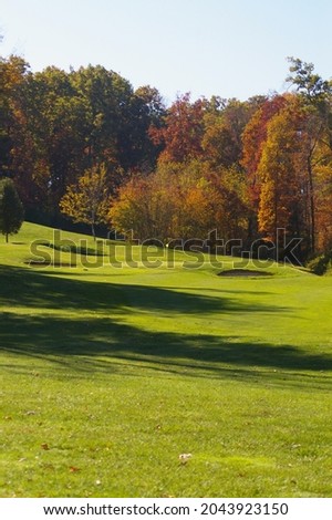 golf greens in the fall Royalty-Free Stock Photo #2043923150