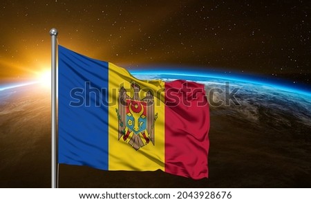 Moldova national flag cloth fabric waving on beautiful sky.