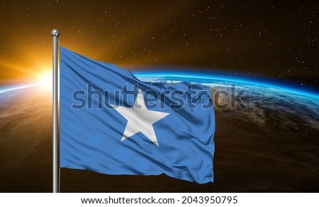 Somalia national flag cloth fabric waving on beautiful sky.