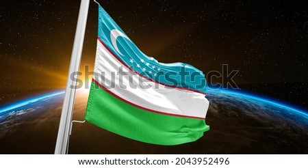 Uzbekistan national flag cloth fabric waving on beautiful sky.