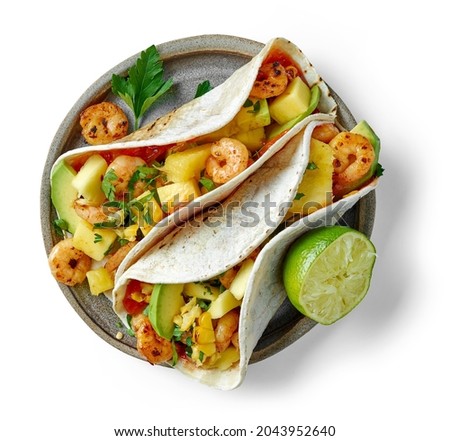 Plate of Mexican food Tacos isolated on white background, top view