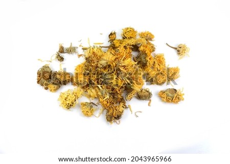 Calendula officinalis or Marigold dry tea flowers isolated. Calendula or pot marigold medicinal herbs on white background.