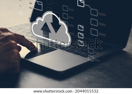 Man using cloud technology system with business information networking. Online digital data storage and connection service for download or upload via cyberspace or server. Royalty-Free Stock Photo #2044015532