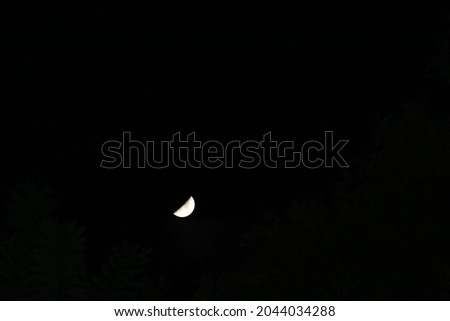 Moon in dark sky in the night