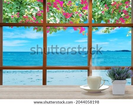 On the brown table, there white coffee cups and Small green leaves in pots. Sea view background blue sky clouds. The top section with bougainvillea flowers, white, pink.
Feelings, sadness, loneliness