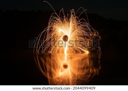 Steel wool and it's reflection in a lake