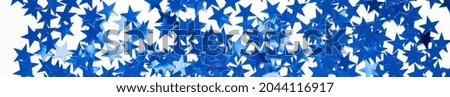 banner of Christmas background with blue star confetti. Holiday background for New Year on white background