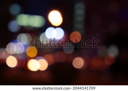 Christmas background with bokeh. Abstract background with bright bokeh. Dark abstract background. Valentine's day 
