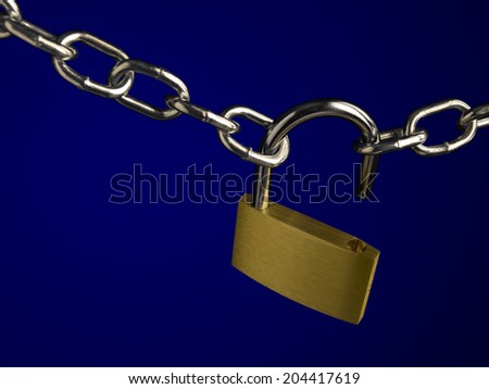 Padlock and chain on blue