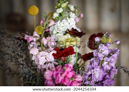 Bunch of beautiful cottage cut flowers in rustic country setting