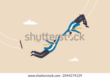 Trust, partnership and support to success in work, collaborate or cooperate teamwork, risk taking, unity or help to achieve target concept, businessman trapeze perform jumping and catch by partner. Royalty-Free Stock Photo #2044274129