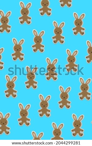 Background for the design and banner. A brown hare on a blue background. Pattern. Vertical image