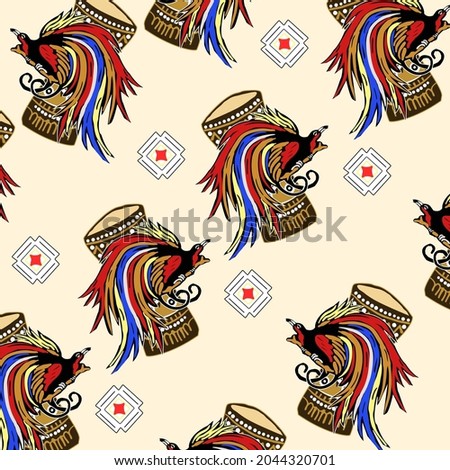 Beautiful motif of Papua batik with bird of paradise pattern and tifa musical instrument.