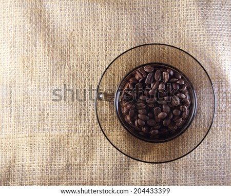 High resolution natural roasted coffee in beautiful transparent cup