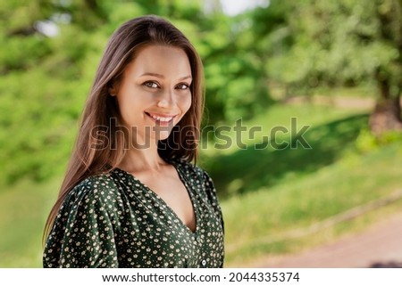 Photo of cheerful nice glad pretty cute lady shiny beaming smile trip weather nature park garden outdoors
