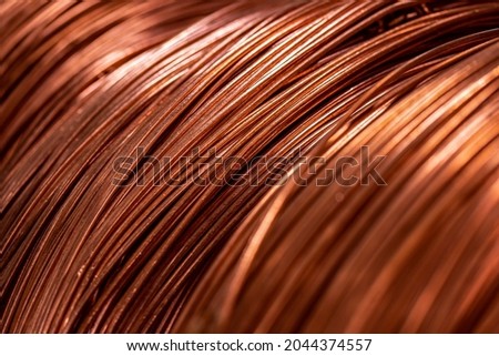 Closeup macro photo copper cable coil background texture, industry factory. Royalty-Free Stock Photo #2044374557