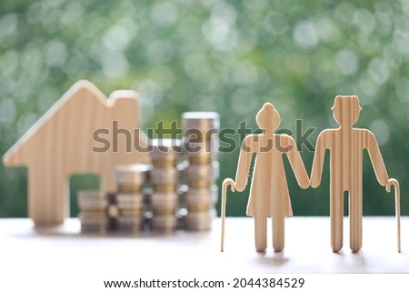 Mutual fund,Love couple senior and model house on natural green background, Save money for prepare in future and pension retirement concept Royalty-Free Stock Photo #2044384529