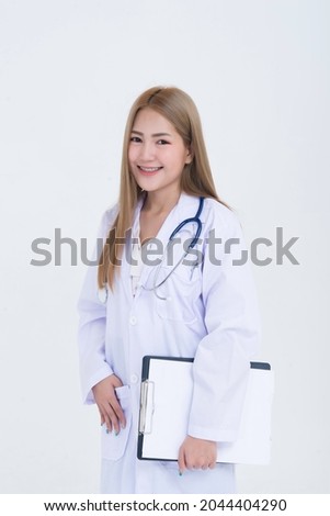 Portrait of young Female doctor with stethoscope on white background,Asian woman,Thailand people,She holding file in hand
